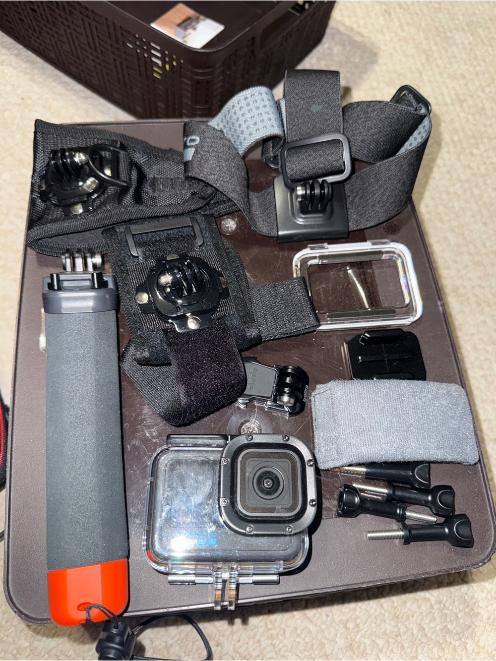 GoPro Accessory Set with Black Mounts and Orange-Tipped Floating Handle